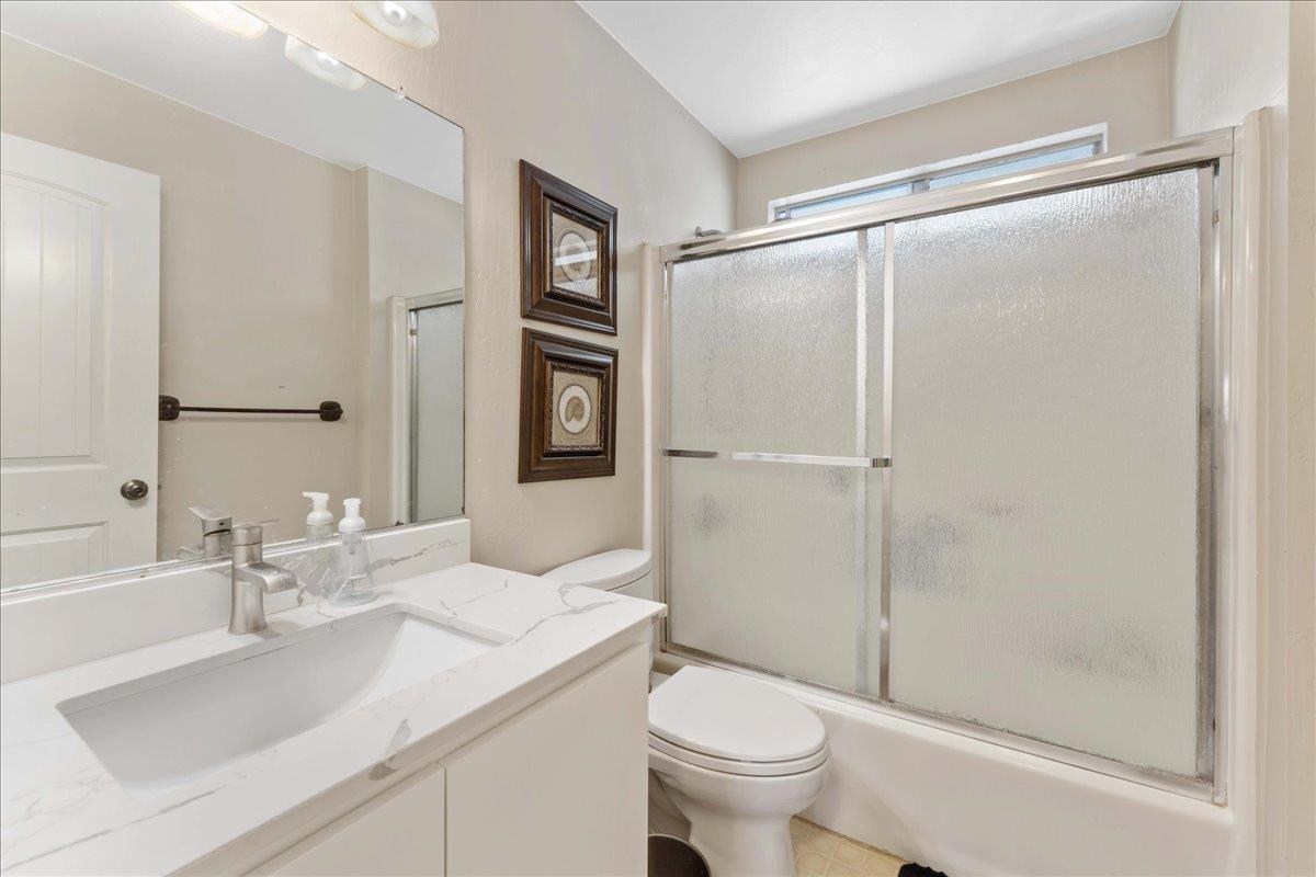 208 Stockton Avenue Capitola, CA 95010 - Photo 26 of 36 a bathroom with a sink toilet and shower