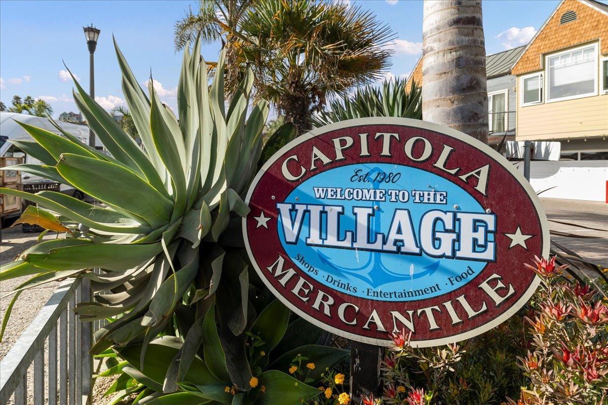 208 Stockton Avenue Capitola, CA 95010 - Photo 30 of 36 a view of a sign board with a sign on a tree