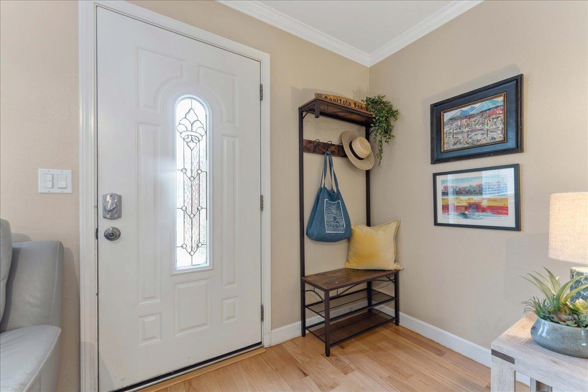 208 Stockton Avenue Capitola, CA 95010 - Photo 6 of 36 a view of a bedroom with furniture and a window