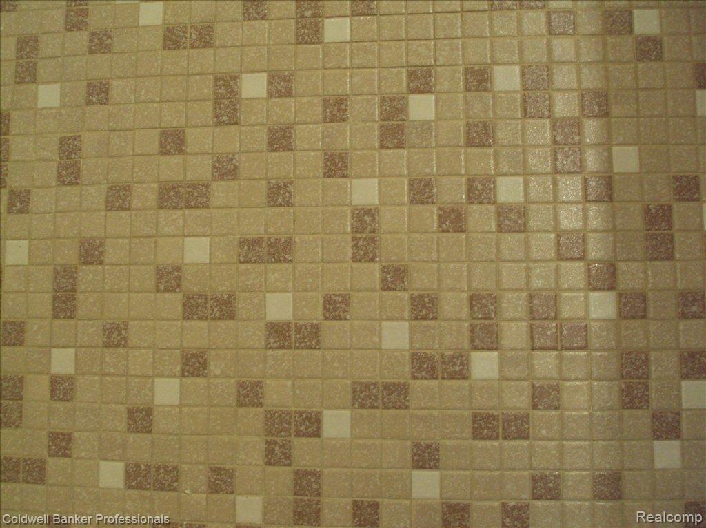 1246 Kings Cove Court, Unit 234 Rochester, MI 48306 - Photo 17 of 24 Main Bath Tile
