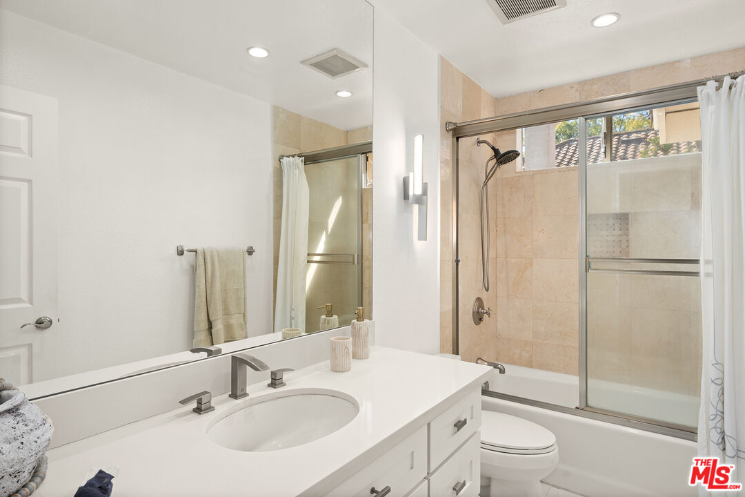 24762 Vía Pradera Calabasas, CA 91302 - Photo 23 of 29 a bathroom with a sink toilet and shower