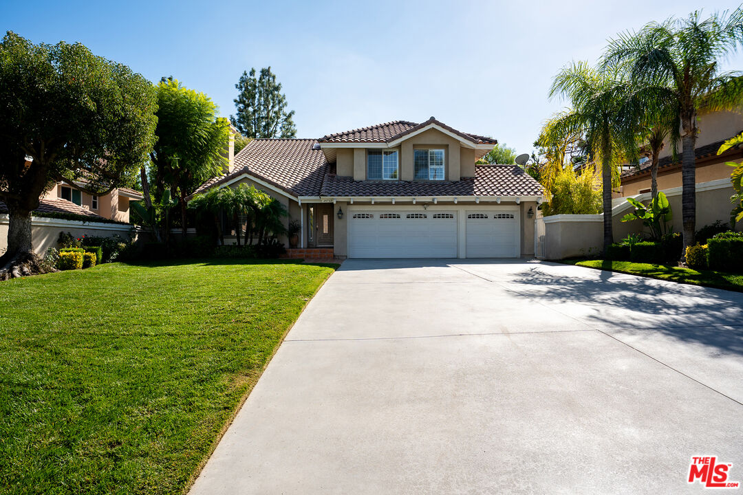 24762 Vía Pradera Calabasas, CA 91302 - Photo 24 of 29 a front view of house with yard and green space