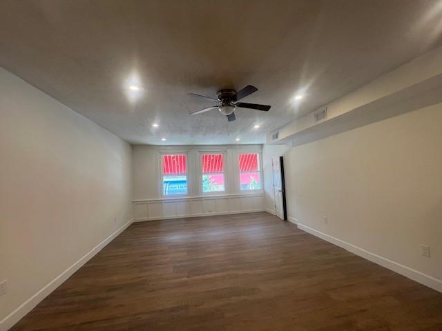566 Merchant Street Ambridge, PA 15003 - Photo 14 of 20 an empty room with wooden floor and windows