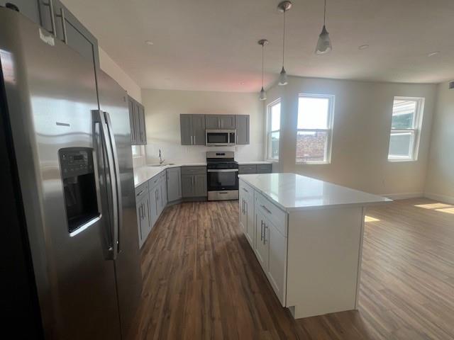 566 Merchant Street Ambridge, PA 15003 - Photo 17 of 20 a kitchen with a refrigerator a sink dishwasher stove and oven