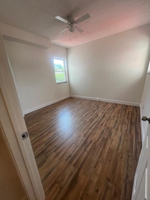 566 Merchant Street Ambridge, PA 15003 - Photo 18 of 20 wooden floor in an empty room with a window