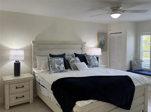 a view of a closet with racks on the wall