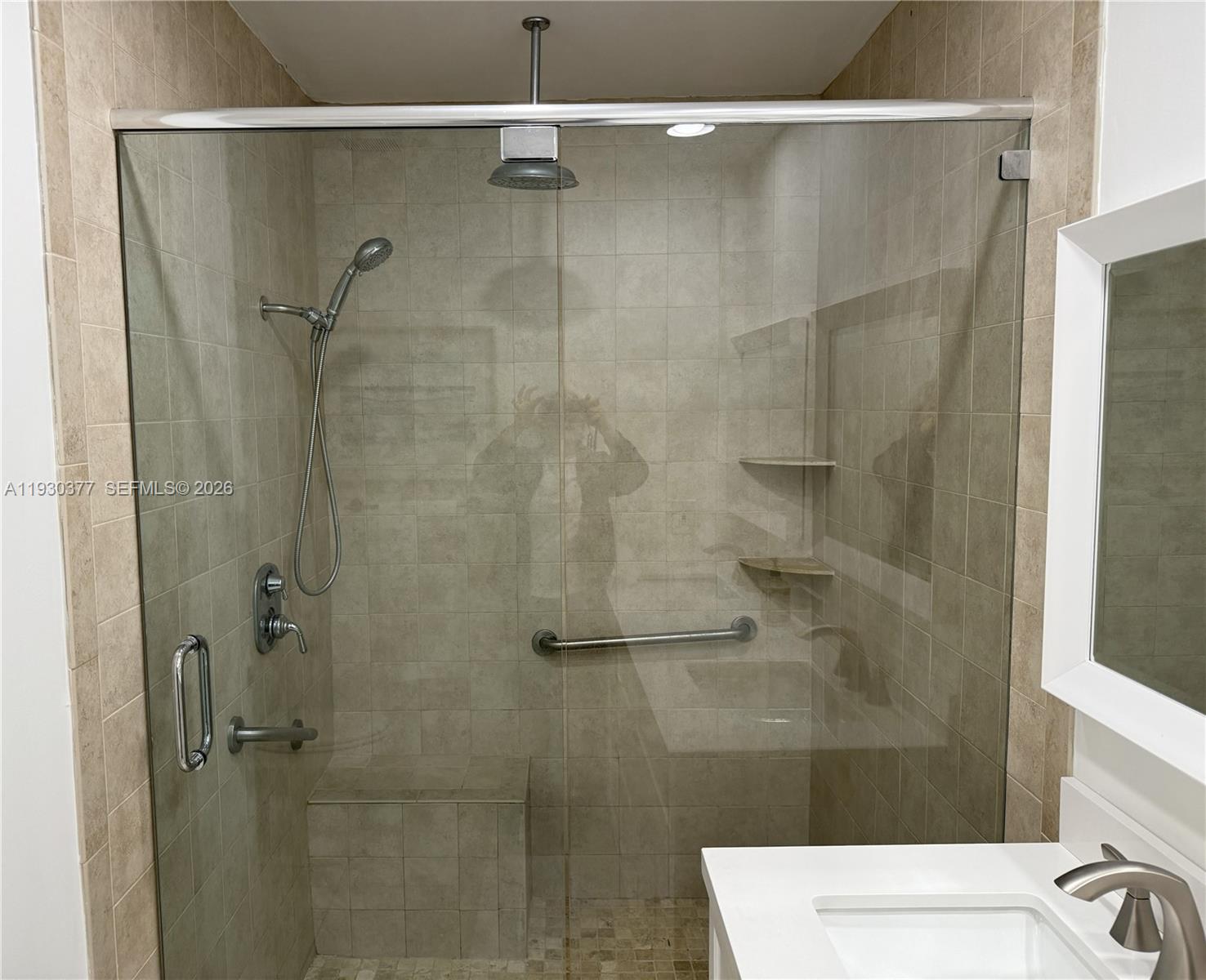 4161 South Us Highway, Unit K1 Jupiter, FL 33477 - Photo 17 of 49 a bathroom with a shower and a sink
