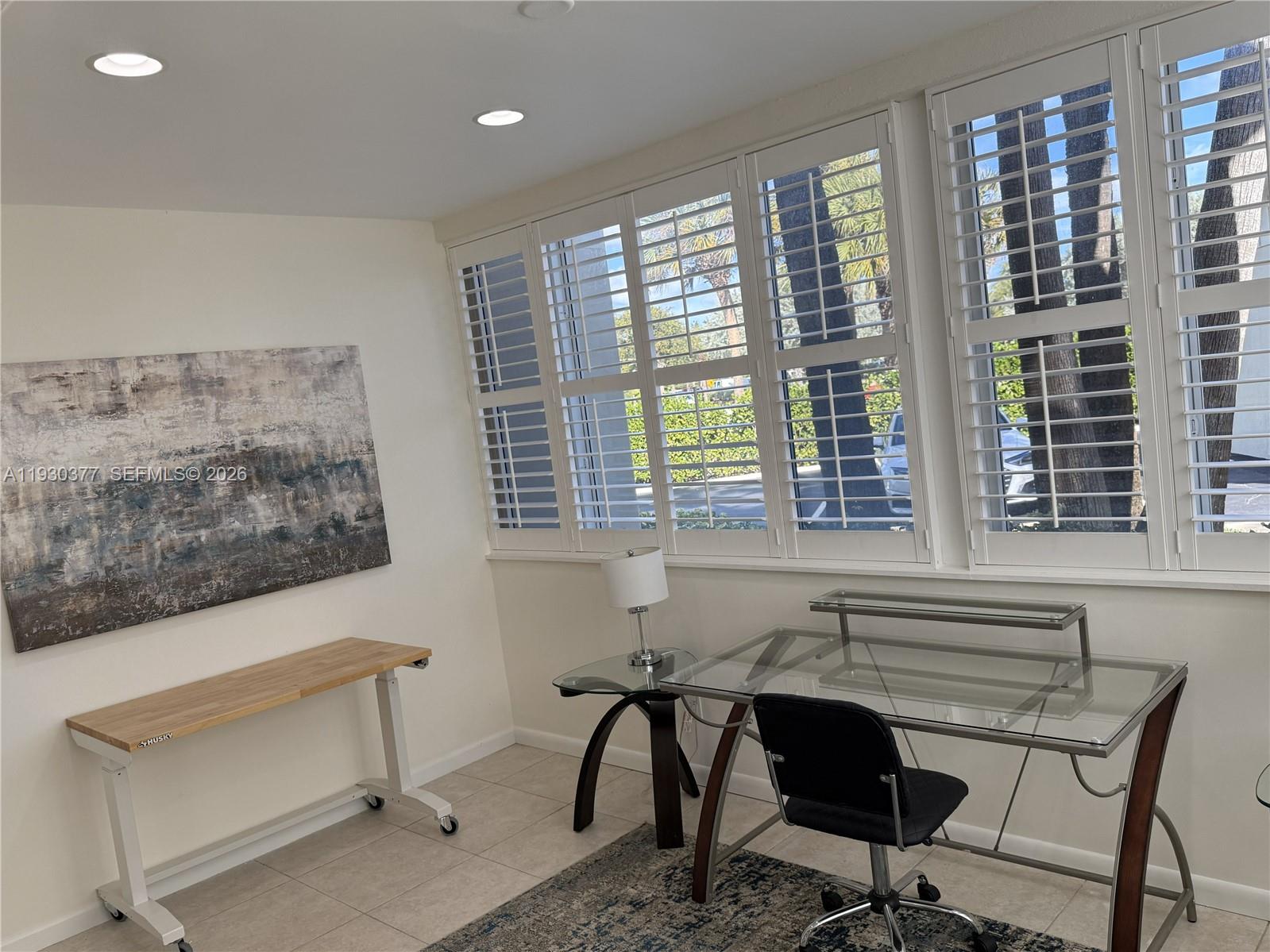 4161 South Us Highway, Unit K1 Jupiter, FL 33477 - Photo 30 of 49 a view of a workspace with furniture and a window