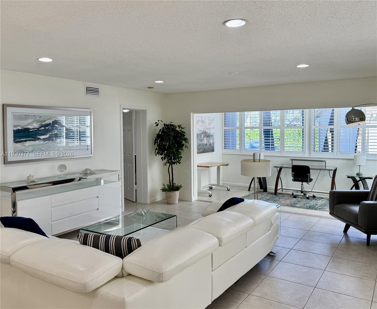 4161 South Us Highway, Unit K1 Jupiter, FL 33477 - Photo 31 of 49 a living room with furniture and a large window