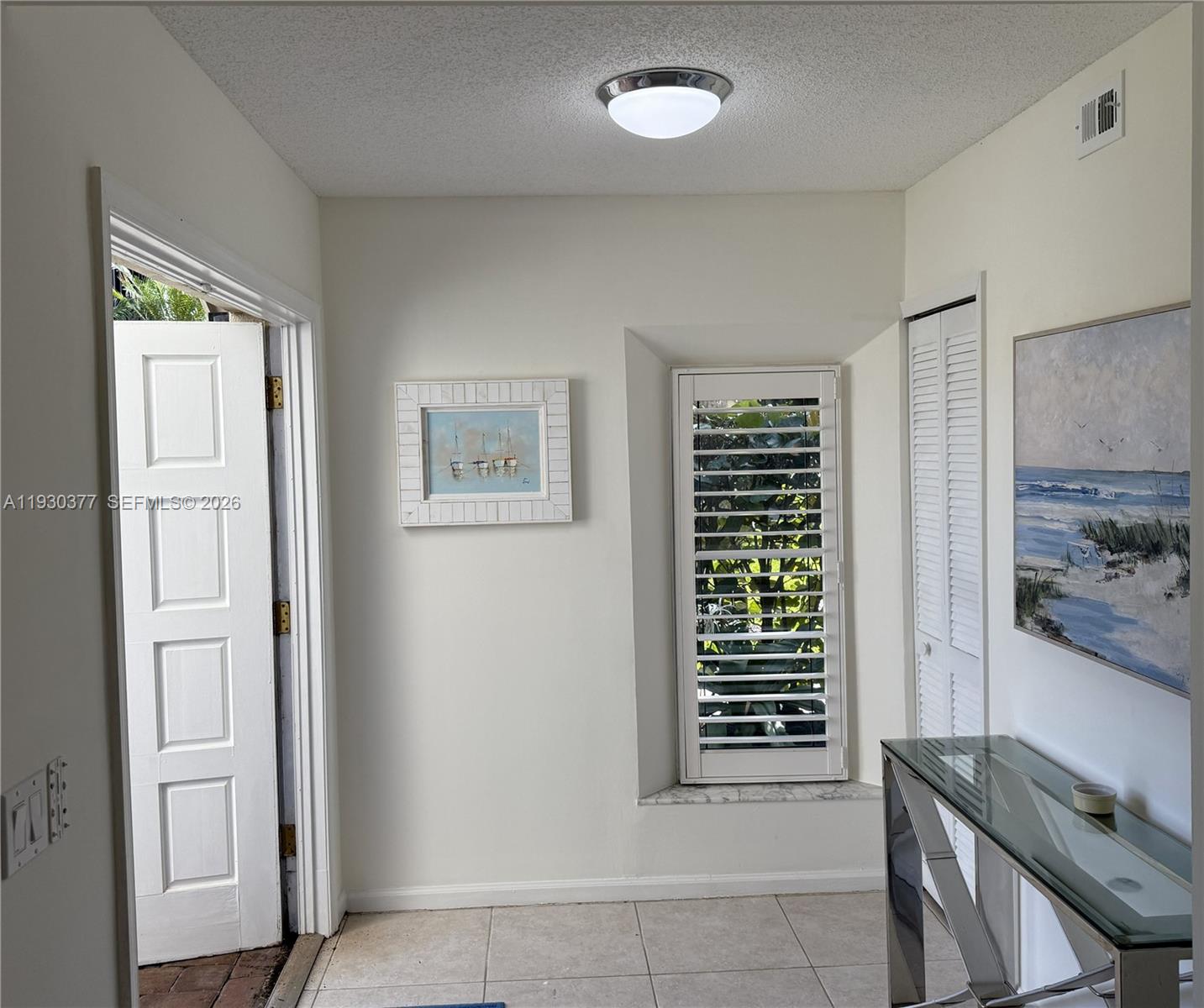 4161 South Us Highway, Unit K1 Jupiter, FL 33477 - Photo 32 of 49 a view of kitchen with furniture and window