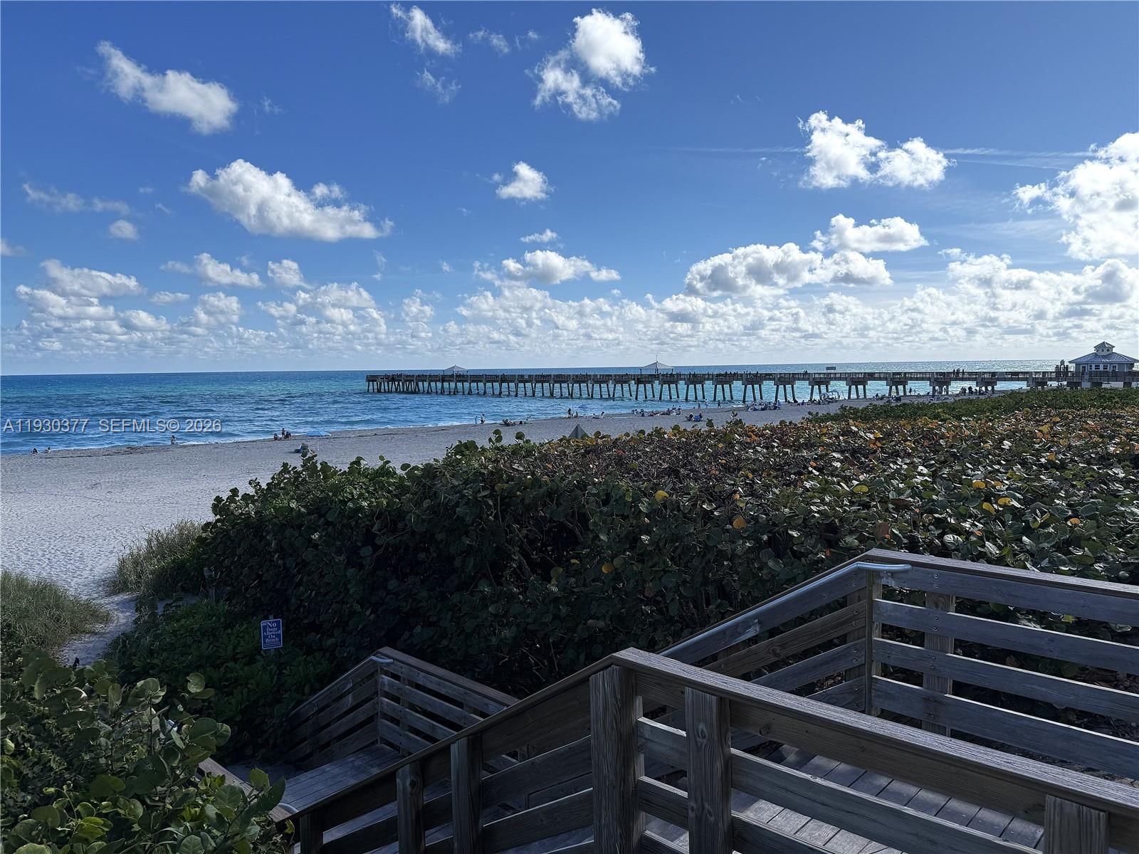 4161 South Us Highway, Unit K1 Jupiter, FL 33477 - Photo 43 of 49 a view of balcony with wooden floor