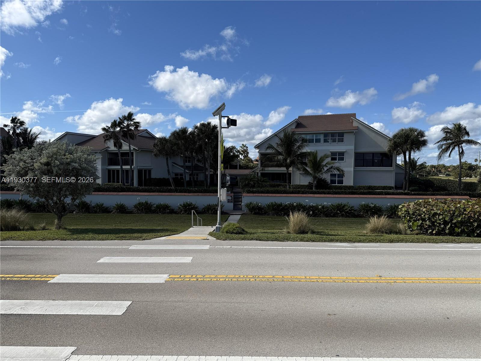 4161 South Us Highway, Unit K1 Jupiter, FL 33477 - Photo 44 of 49 a view of a fountain in front of a house