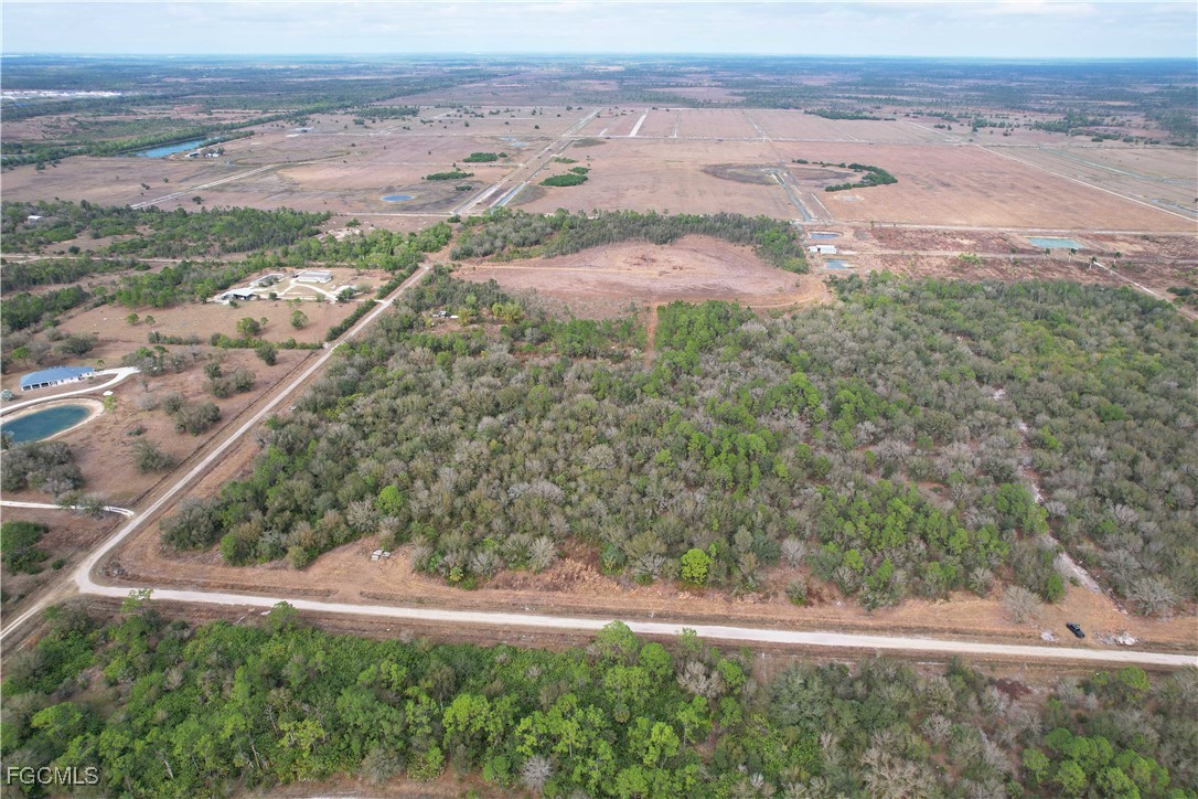an aerial view of mountain with beach