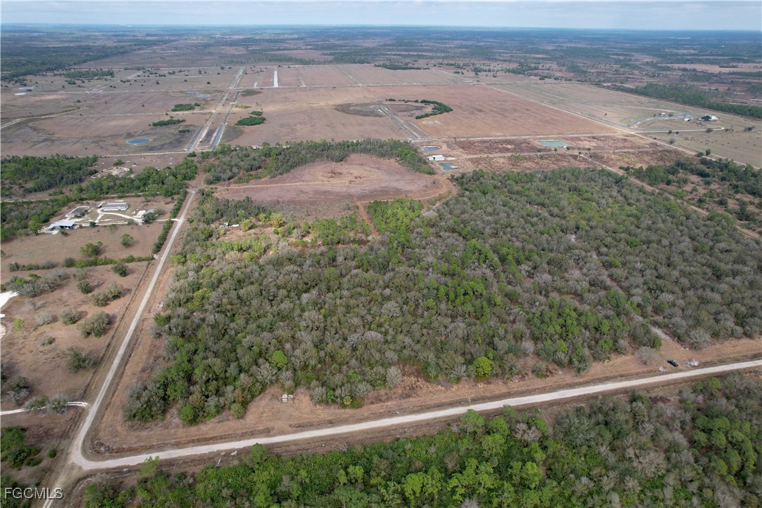 21001 Granville Road Punta Gorda, FL 33955 - Photo 4 of 21 an aerial view of beach and yard