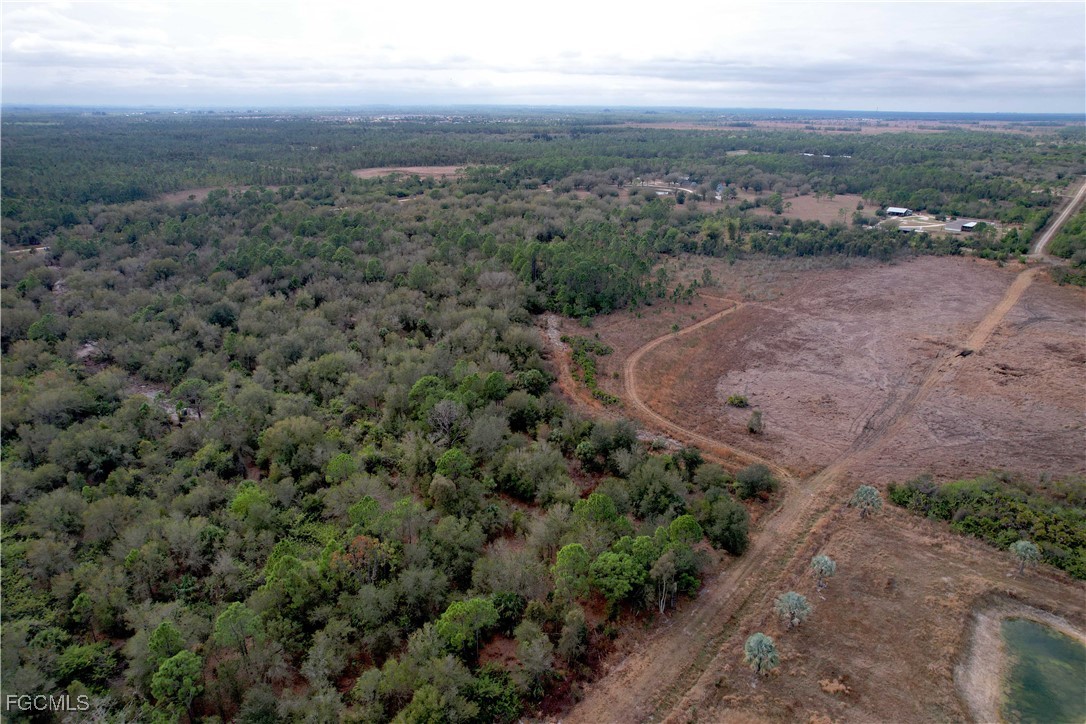 21001 Granville Road Punta Gorda, FL 33955 - Photo 7 of 21 an aerial view of house with outdoor space