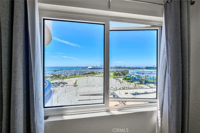 a view of a glass door and a porch