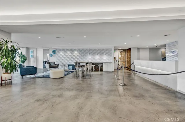 a kitchen with a table and chairs