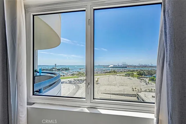 a view of a glass door and a window