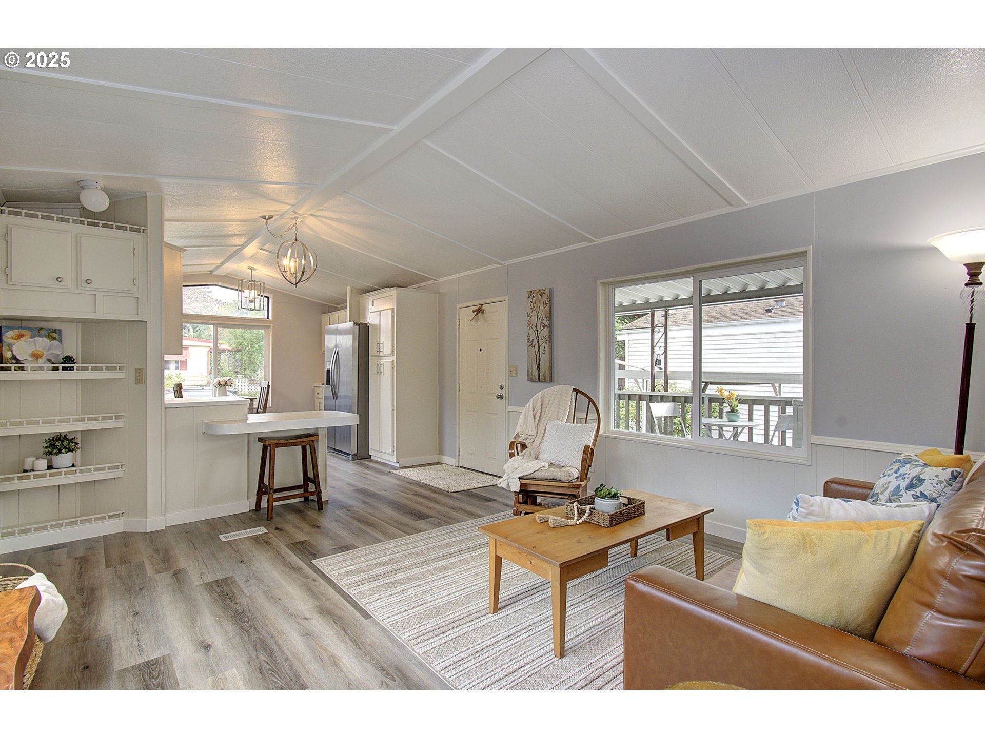 5404 Northeast 121st Avenue, Unit 98 Vancouver, WA 98682 - Photo 6 of 28 a living room with furniture a window and a table