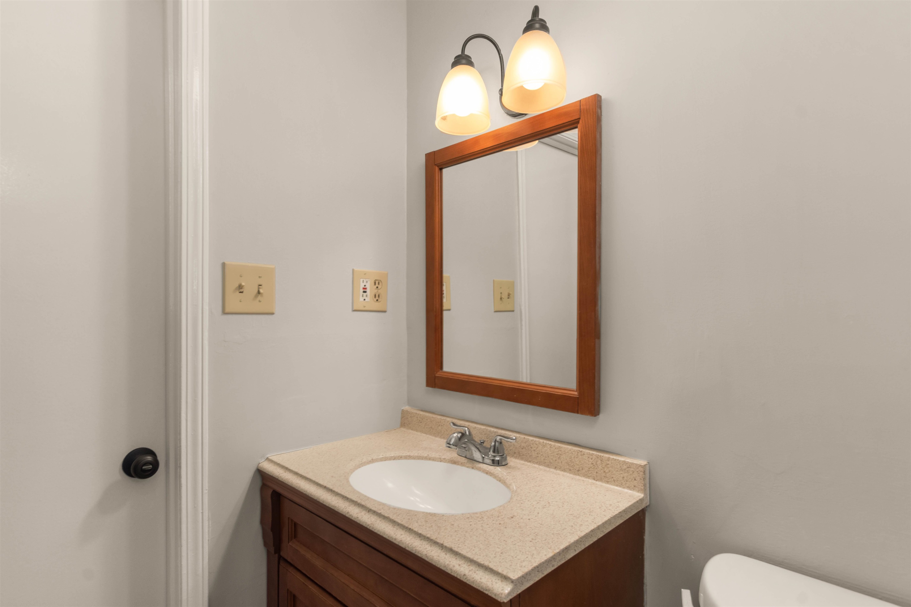 5573 Pleasant View Road, Unit 35 Memphis, TN 38134 - Photo 16 of 25 a bathroom with a sink vanity and a mirror