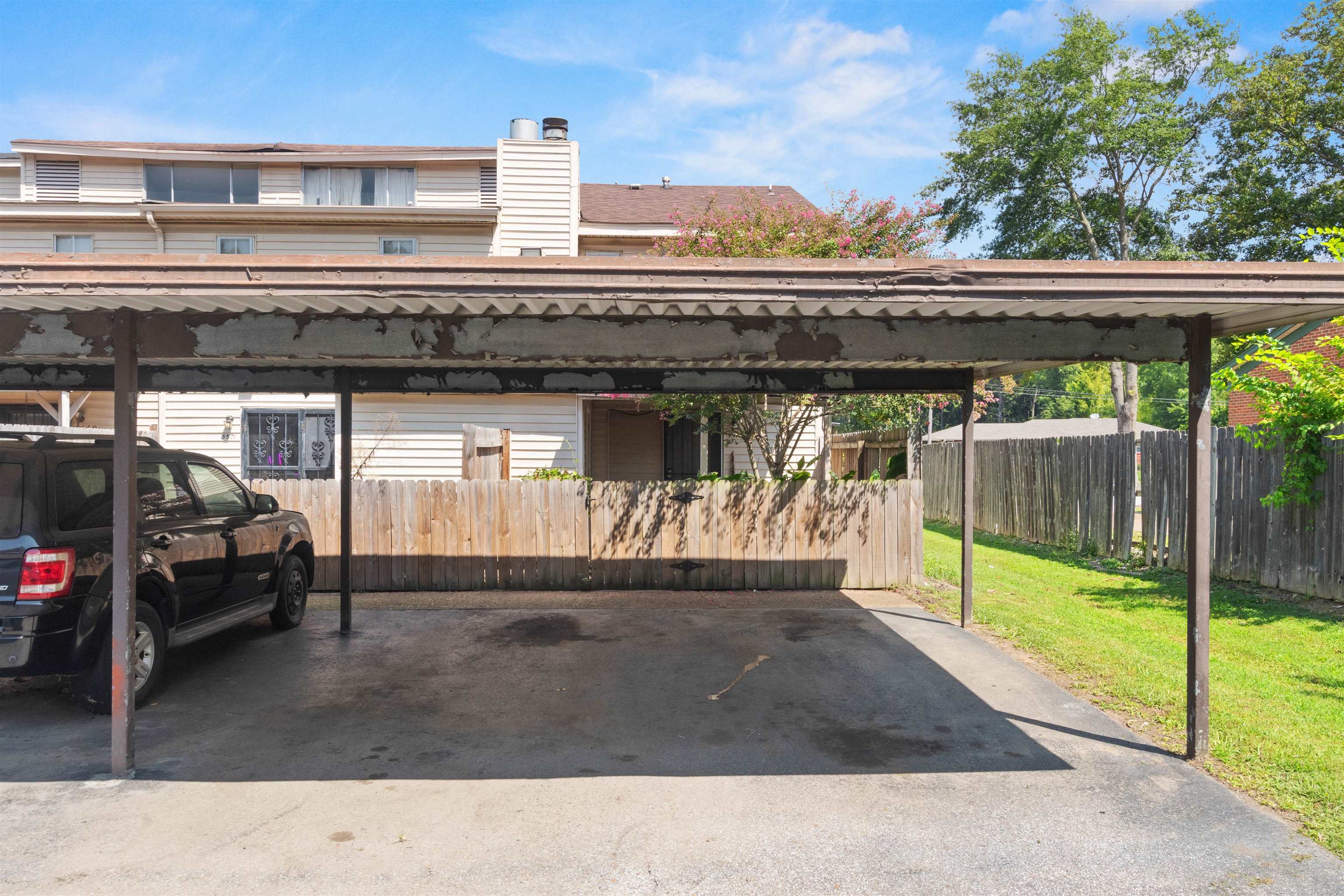 5573 Pleasant View Road, Unit 35 Memphis, TN 38134 - Photo 25 of 25 a black car parked in front of a building