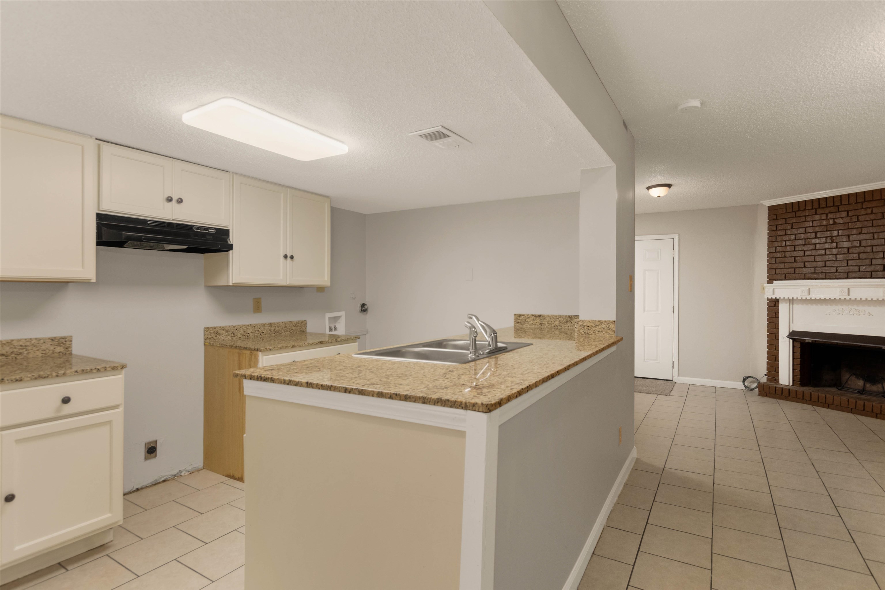 5573 Pleasant View Road, Unit 35 Memphis, TN 38134 - Photo 5 of 25 a utility room with cabinets washer and dryer