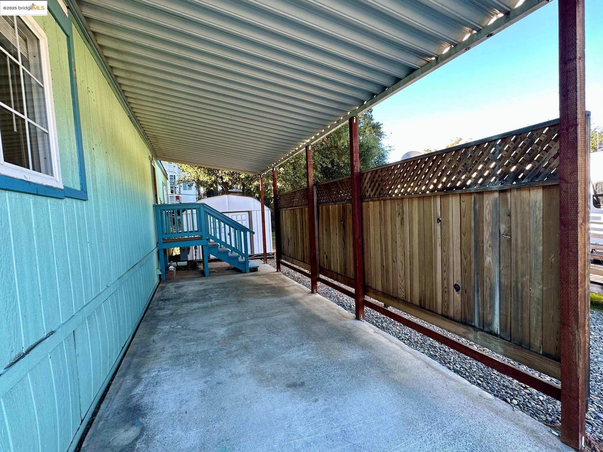 14192 Tuolumne Road, Unit 5 Sonora, CA 95370 - Photo 3 of 12 a view of a backyard with a fence