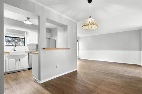 an empty room with view of ceiling fan