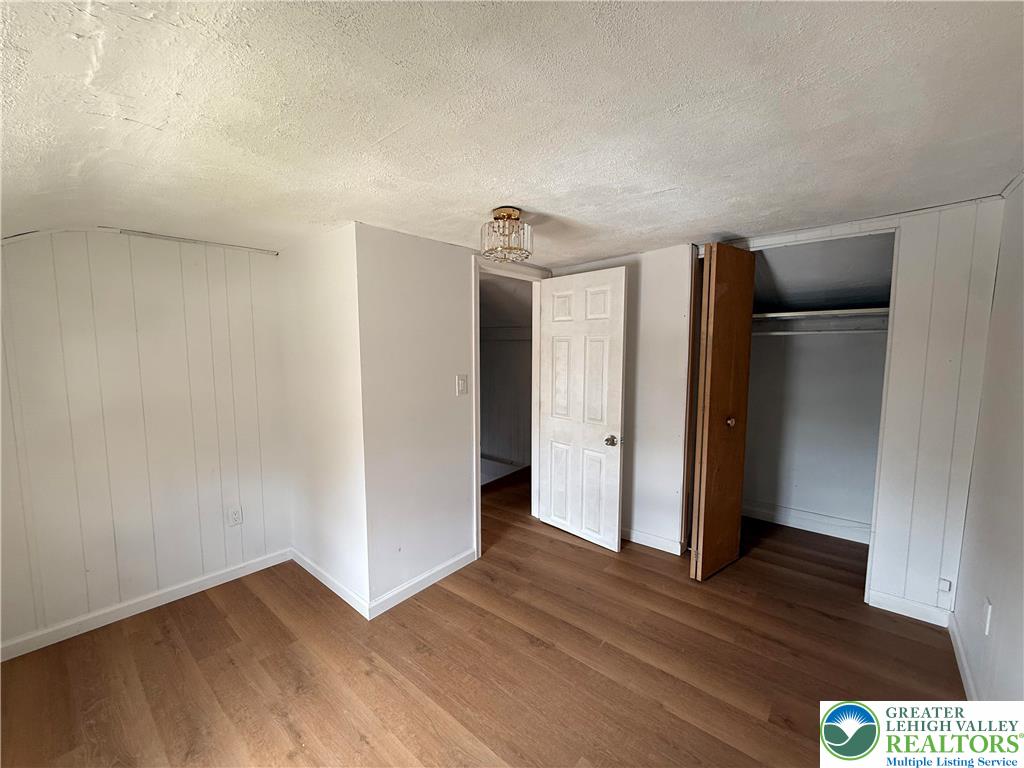 619 Hickory Street Scranton, PA 18505 - Photo 13 of 28 a view of hallway with wooden floor