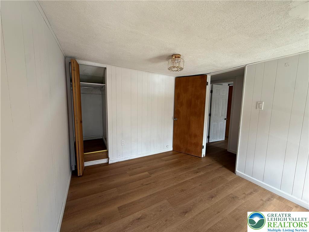 619 Hickory Street Scranton, PA 18505 - Photo 15 of 28 an empty room with wooden floor and closet