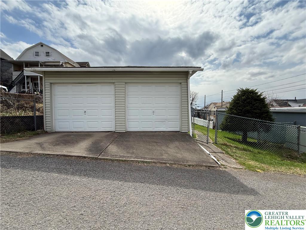 619 Hickory Street Scranton, PA 18505 - Photo 27 of 28 a side view of a house with a garage