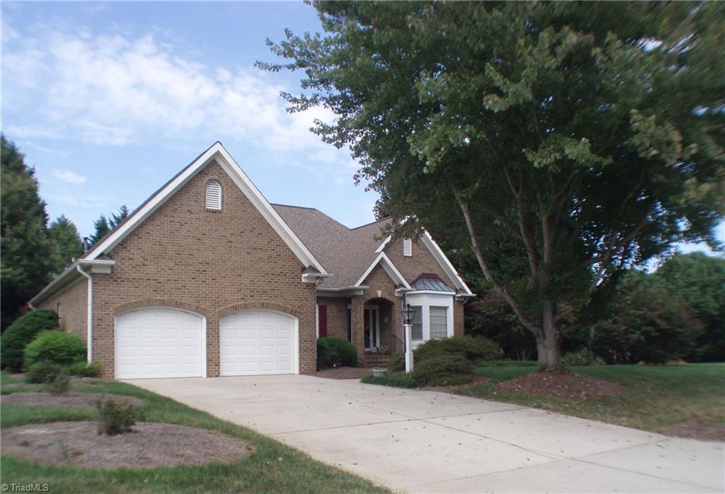 5802 Fleming Terrace Road Greensboro, NC 27410 - Photo 2 of 26 Generous driveway provides plenty of off-street parking for guests.