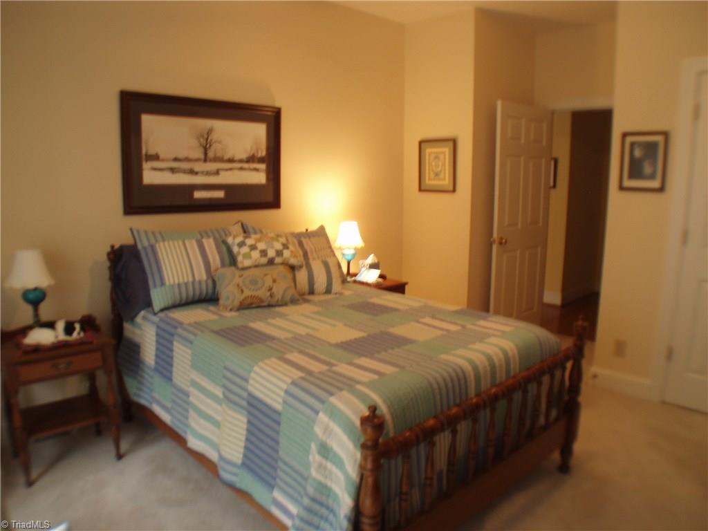 5802 Fleming Terrace Road Greensboro, NC 27410 - Photo 19 of 26 This is the second of two additional bedrooms. Both are located on the opposite side of the home from the master suite.