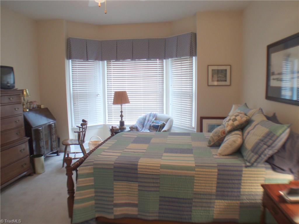 5802 Fleming Terrace Road Greensboro, NC 27410 - Photo 20 of 26 This second bedroom features a pretty bay window.