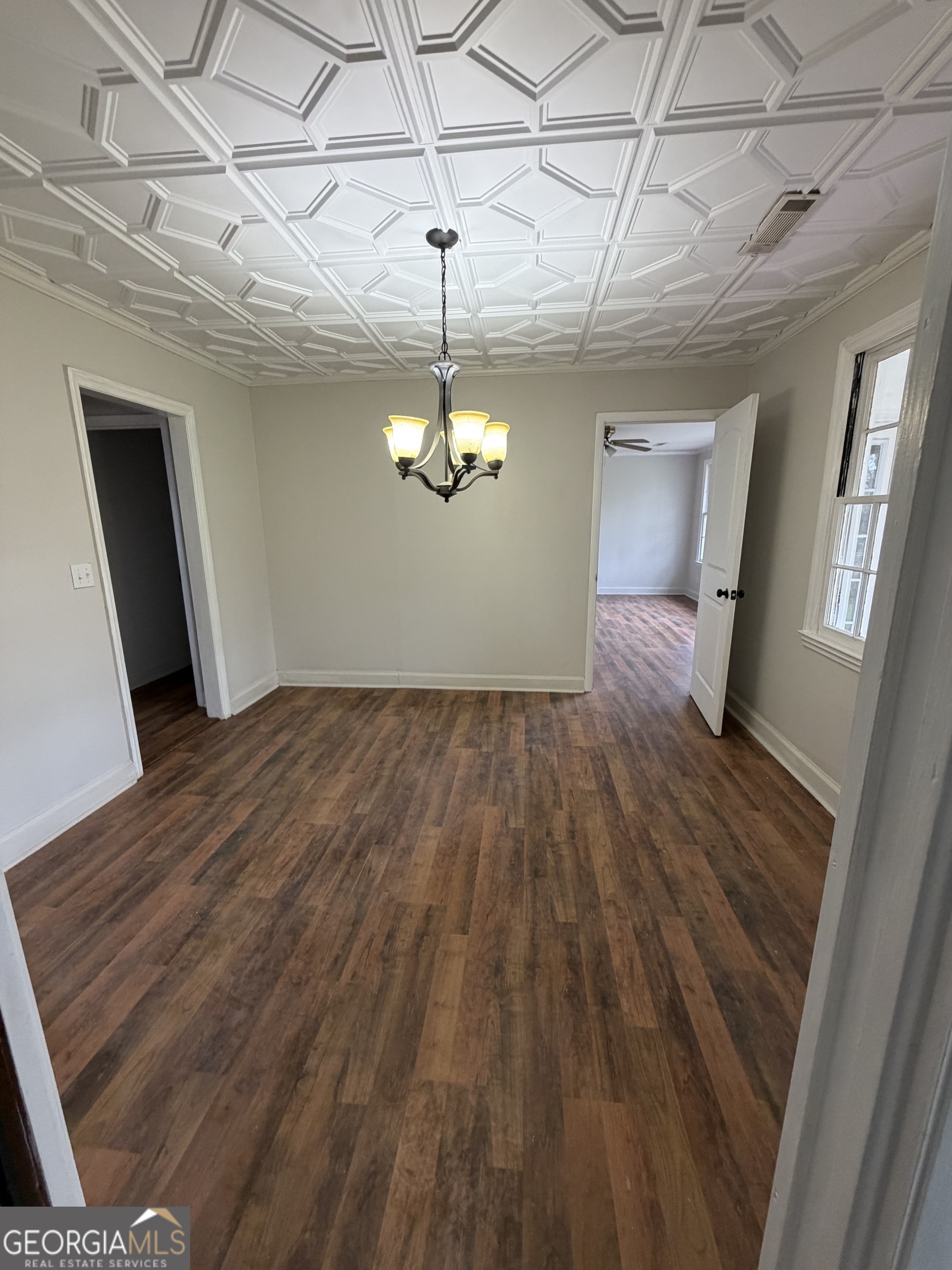 412 West 4th Street Vidalia, GA 30474 - Photo 22 of 23 a view of empty room with wooden floor