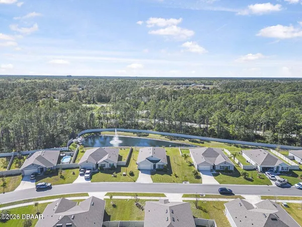 a view of swimming pool with seating space