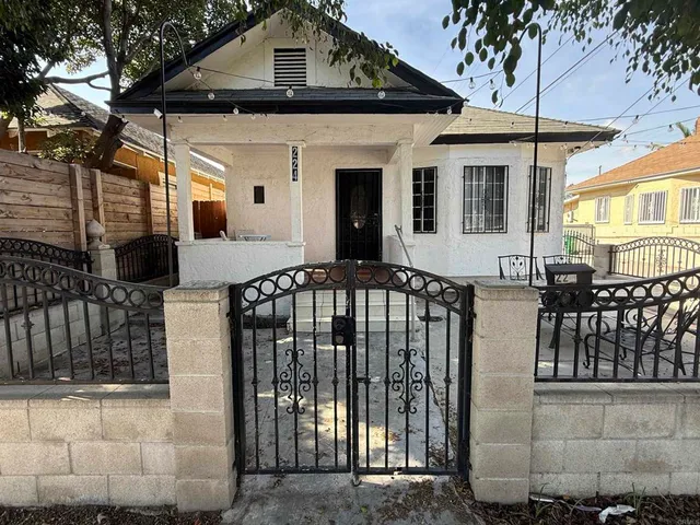 a front view of a house with a porch