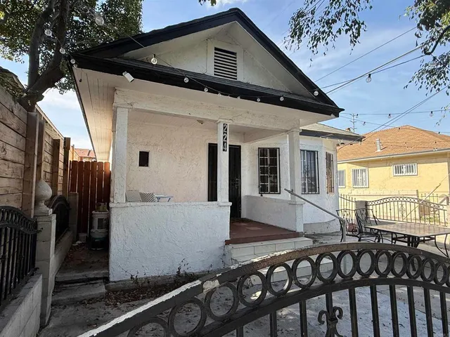a front view of a house with glass windows