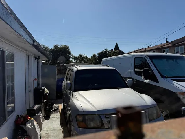 a view of roof deck with car parked