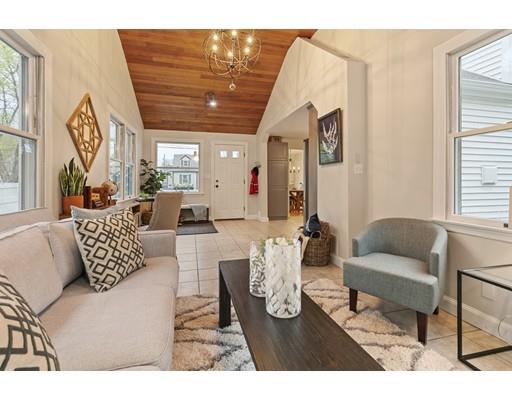 10 Yale Road Arlington, MA 02474 - Photo 12 of 23 a living room with furniture and a large window