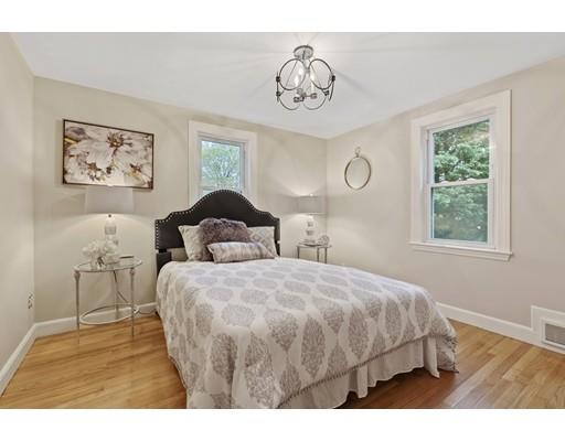 10 Yale Road Arlington, MA 02474 - Photo 15 of 23 a bedroom with a bed and a table in it