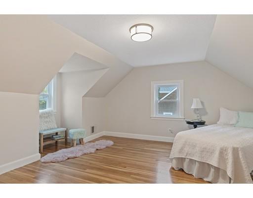 10 Yale Road Arlington, MA 02474 - Photo 17 of 23 a bedroom with a bed and a lamp