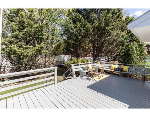 10 Yale Road Arlington, MA 02474 - Photo 23 of 23 a roof deck with chairs and wooden floor