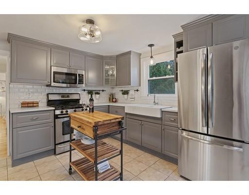 10 Yale Road Arlington, MA 02474 - Photo 5 of 23 a kitchen with stainless steel appliances a refrigerator stove microwave and sink