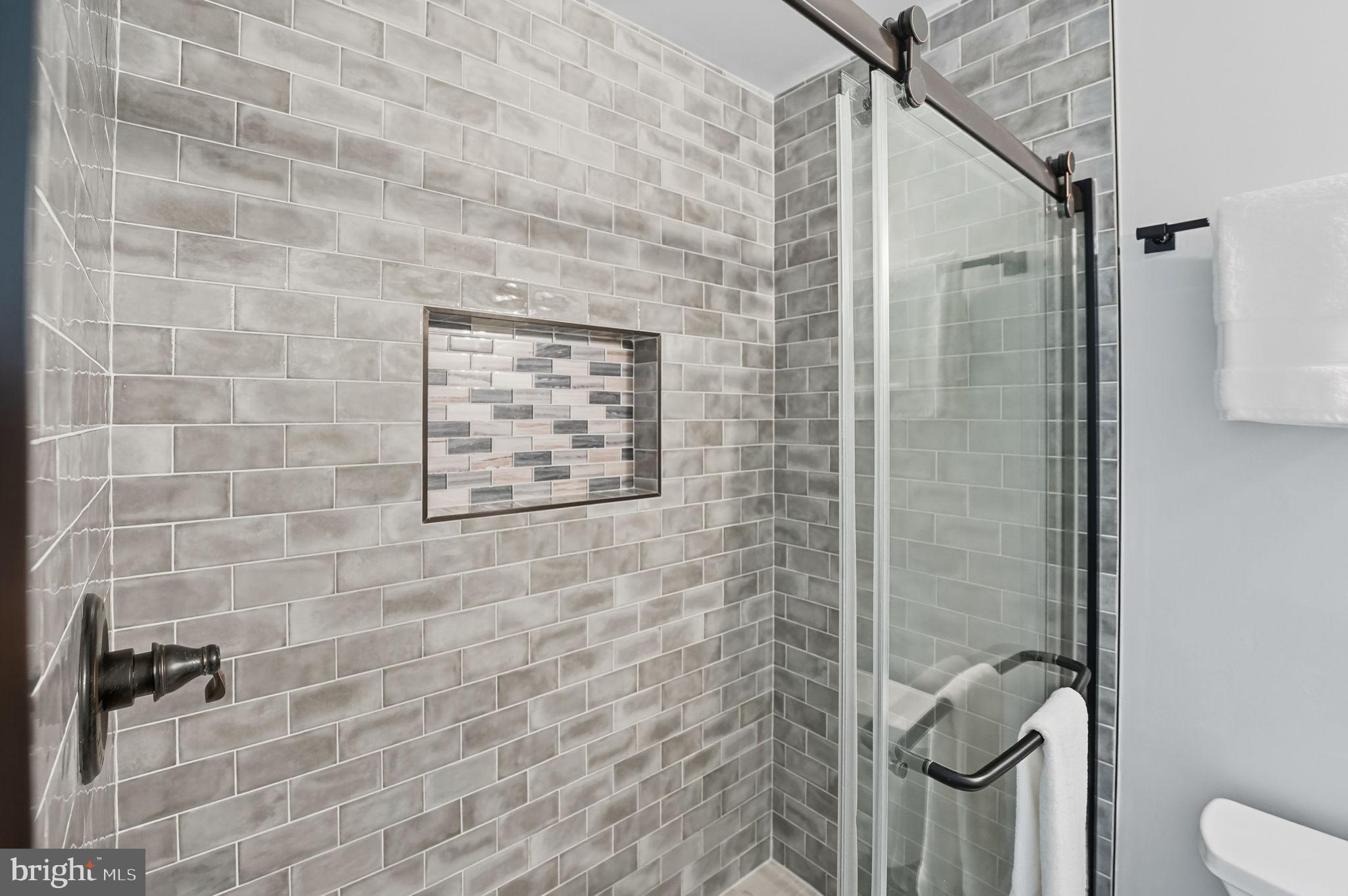 3708 Woodridge Avenue Silver Spring, MD 20902 - Photo 21 of 38 a bathroom with a shower