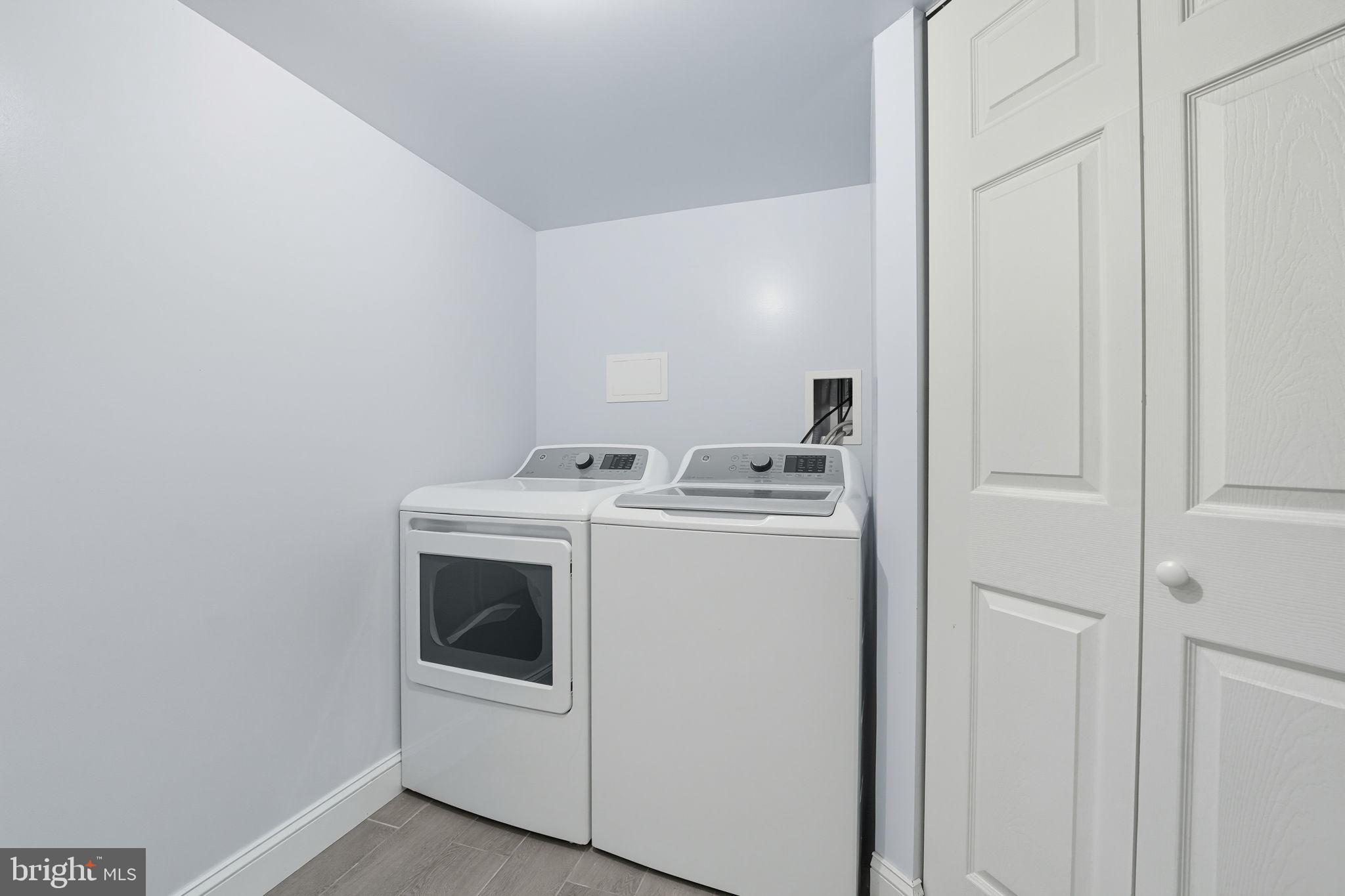 3708 Woodridge Avenue Silver Spring, MD 20902 - Photo 27 of 38 a utility room with dryer and washer