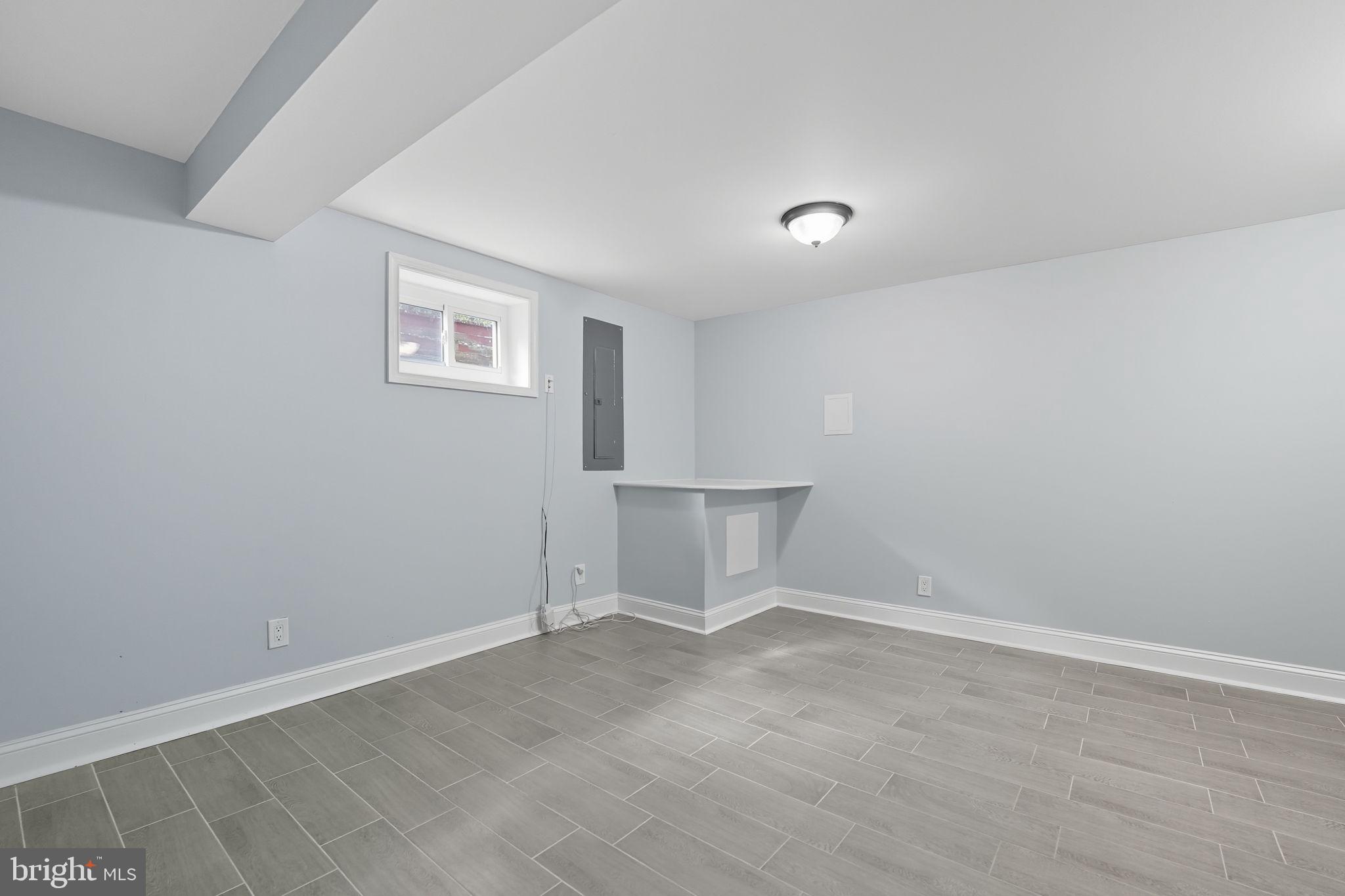 3708 Woodridge Avenue Silver Spring, MD 20902 - Photo 29 of 38 wooden floor in an empty room