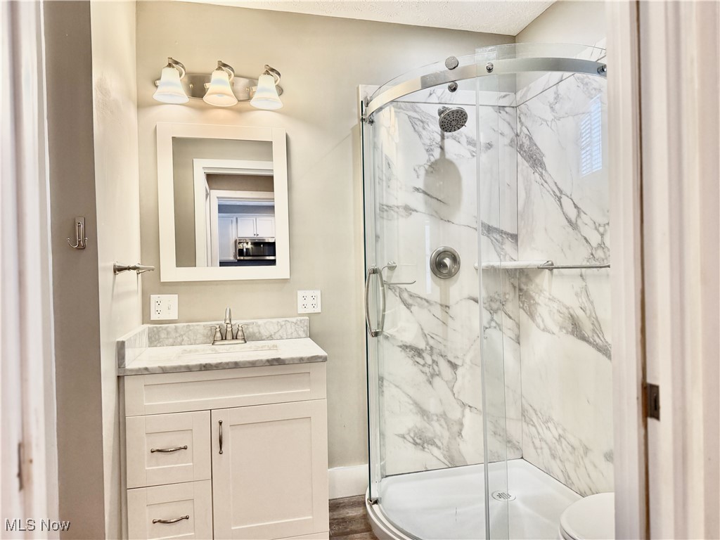 3024 Dutt Road Barberton, OH 44203 - Photo 22 of 33 BATHROOM #2! STUNNING CHOICES OF MARBLE-STYLE SHOWER SURROUND AND SINK. ALL NEW IN 2019!
