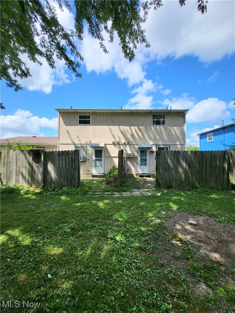637 Root Road Lorain, OH 44052 - Photo 24 of 27 Rear view of house with a lawn