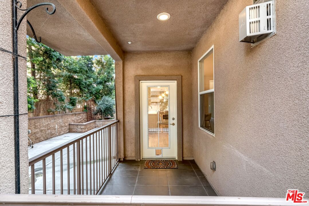 1248 North Laurel Avenue, Unit 103 West Hollywood, CA 90046 - Photo 19 of 25 a view of a door front of a house